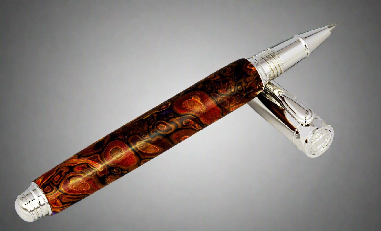 Shows a rollerball pen with palm root